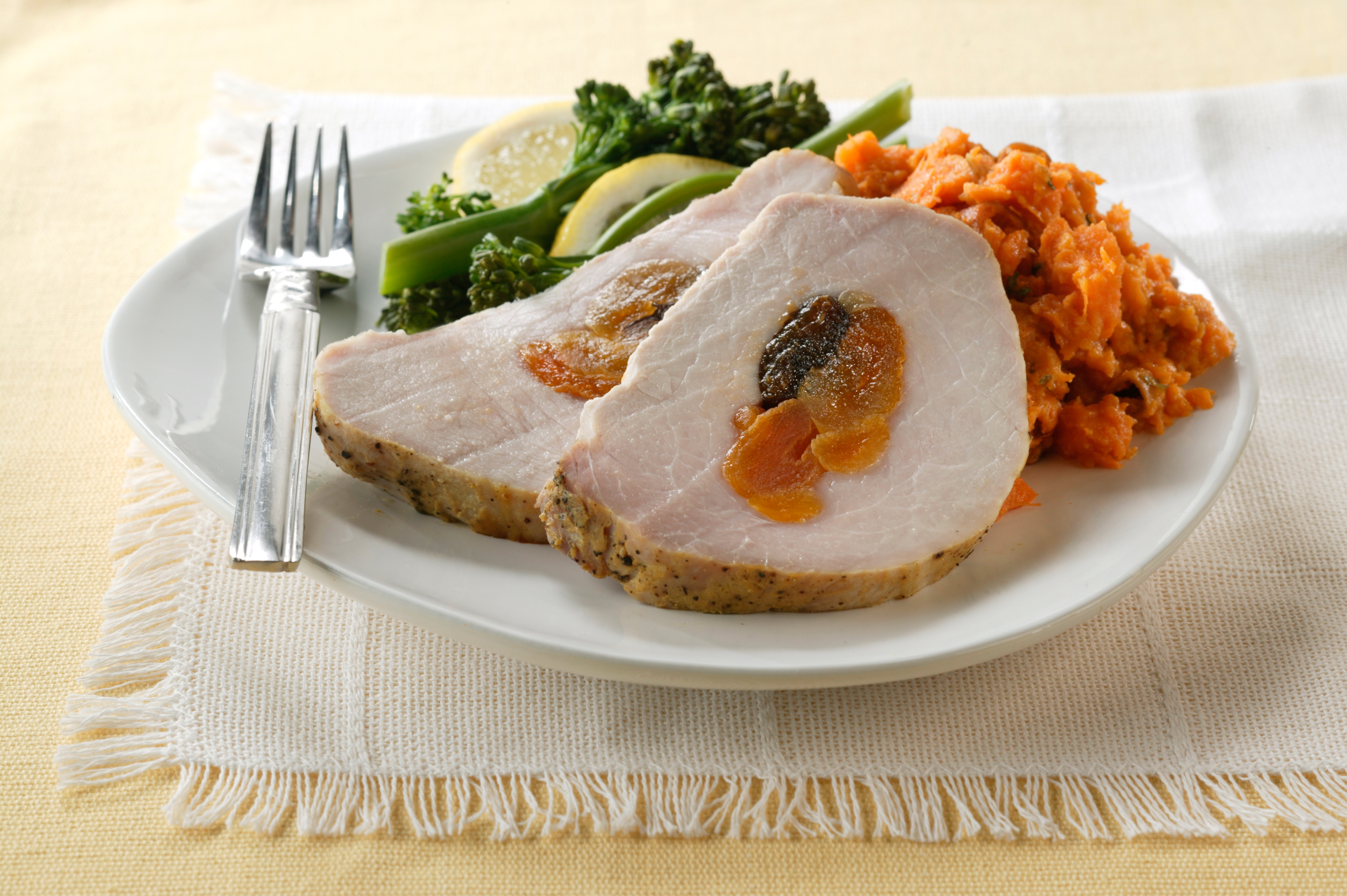 FruitStuffed Pork Loin with DijonGarlic Crust Pork Recipes Pork